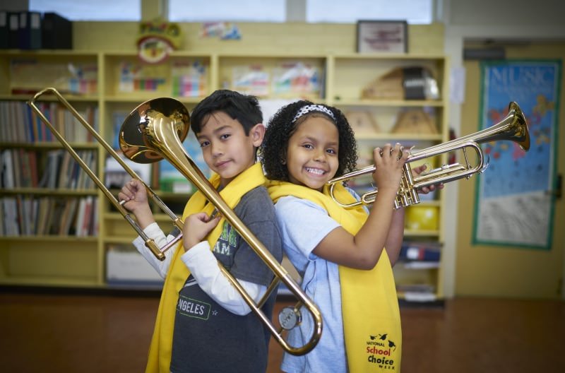 students engage in offline learning by playing musical instruments