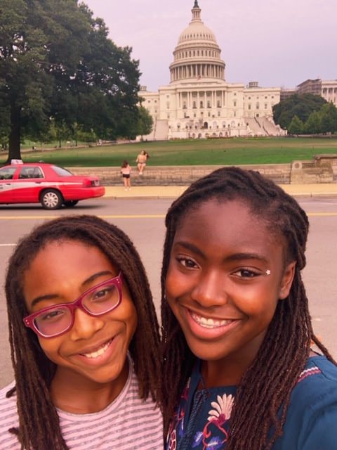 homeschooling-sisters-smile-in-front-of-white-house