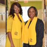 principal teacher wearing yellow school choice scarves