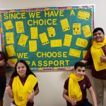 students wearing yellow scarves bulletin board