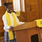 student speaking at podium