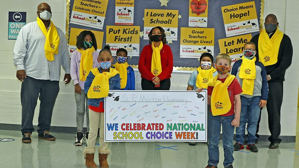 kids-hold-NSCW-banner
